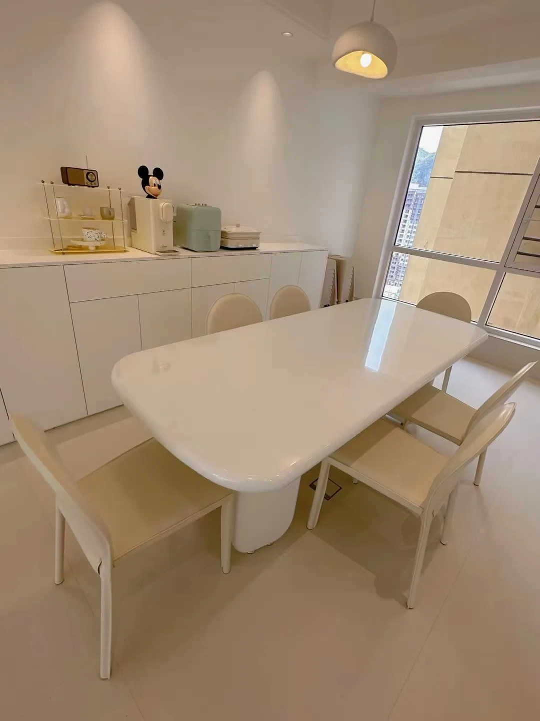 Modern Minimalist Apartment with Limestone Look Tiles - Modern Minimalist Dining Room with Limestone Look Tiles