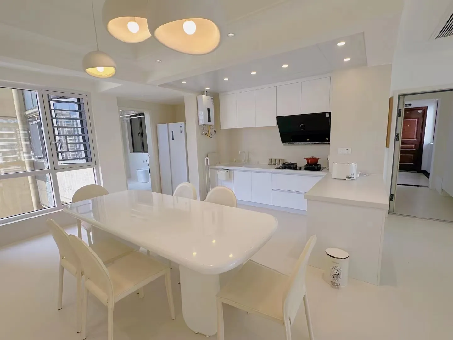 Modern Minimalist Apartment with Limestone Look Tiles - Modern Minimalist Kitchen with Limestone Look Tiles